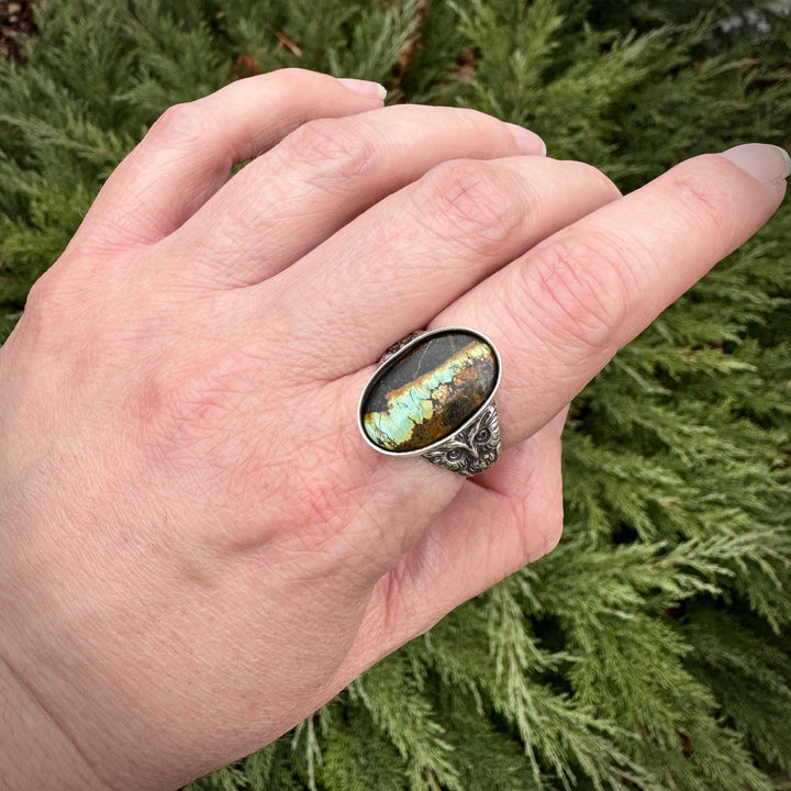 Handcrafted blackjack turquoise owl ring paired with everyday style, showcasing versatility of artisan silver jewelry. Handcrafted in Fort Collins, Colorado.