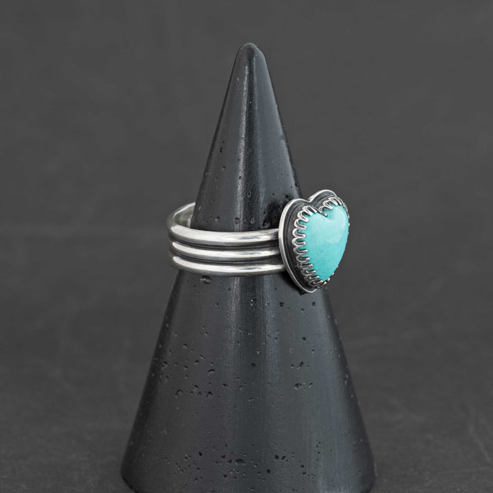 Sterling silver ring featuring vibrant robin's egg blue Sonora turquoise heart, shown at angle, size 10