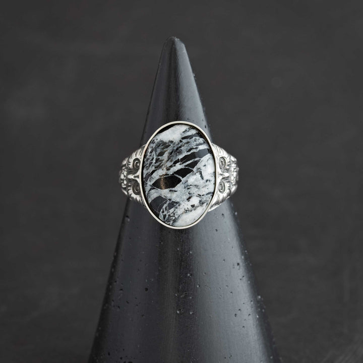 Handcrafted sterling silver owl ring with genuine White Buffalo stone cabochon