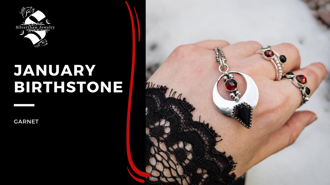 A hand balances a red garnet pendant necklace next to the words january birthstone garnet and the Silverthaw Jewelry logo.