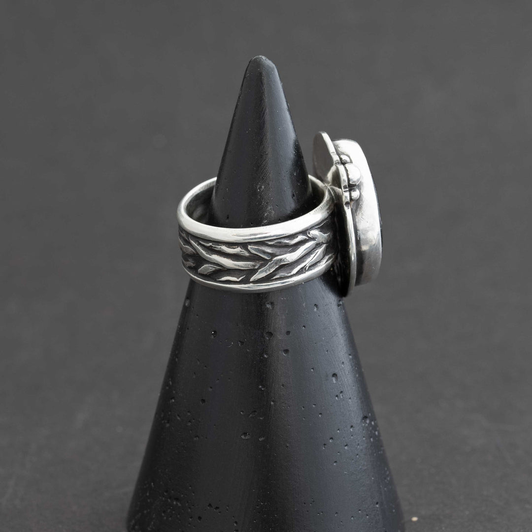 Textured sterling silver ring band with oxidized detail, side view, handmade in Fort Collins Colorado
