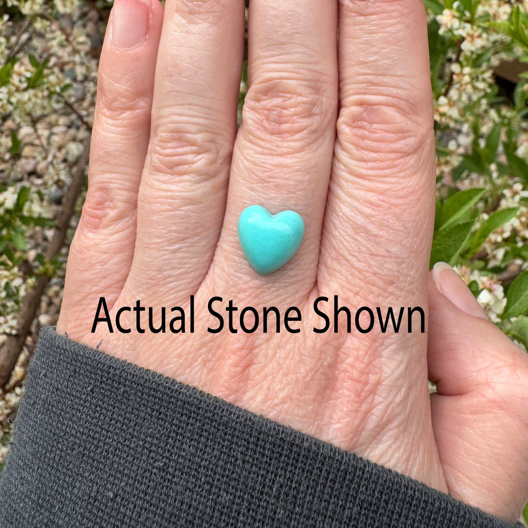 Bespoke sterling silver ring featuring vibrant robin's egg blue Sonora turquoise heart, customizable size