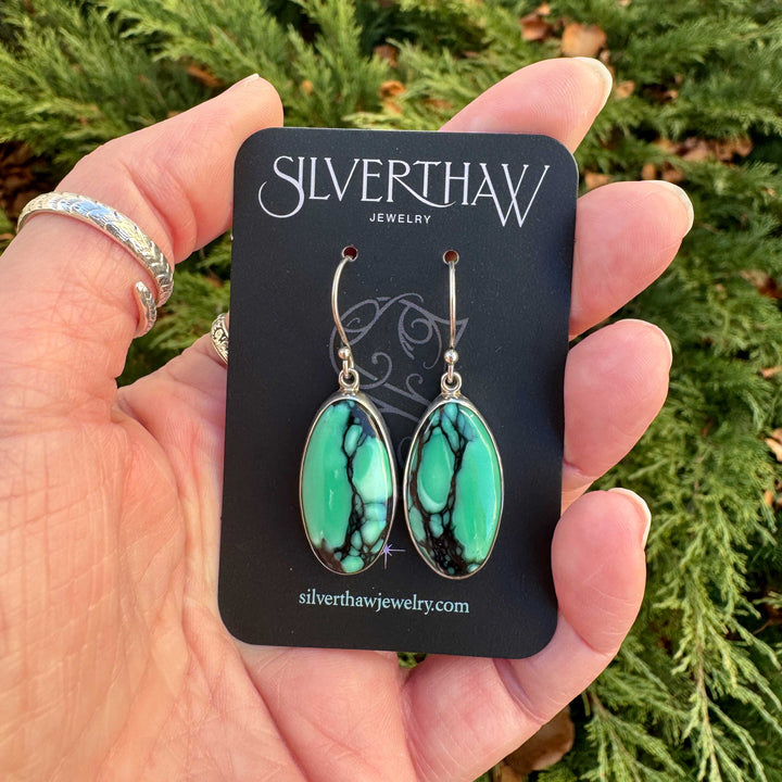 Emerald Rose variscite earrings displayed on Silverthaw Jewelry branded card.