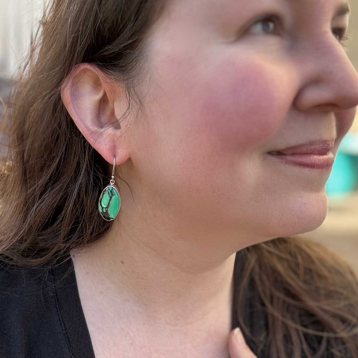 Emerald Rose variscite dangle earrings worn to show size and fit.