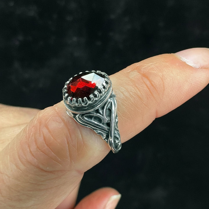 Handcrafted gothic garnet ring in sterling silver with vintage scrollwork band and rose-cut Mozambique garnet.