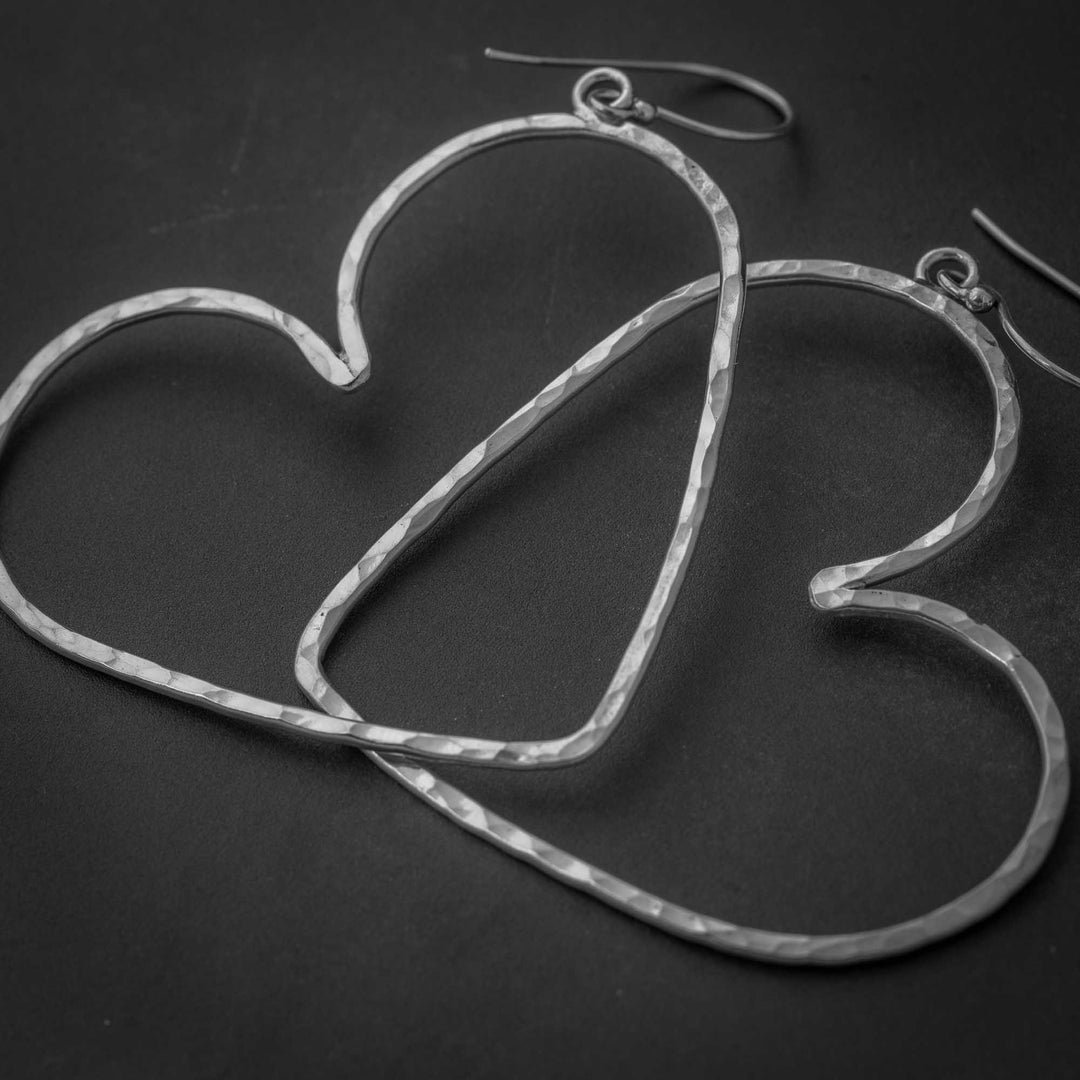Hammered sterling silver heart dangle earrings with large open heart hoops