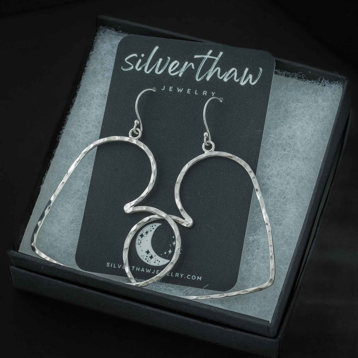 Handmade sterling silver heart hoop earrings packaged as a romantic gift