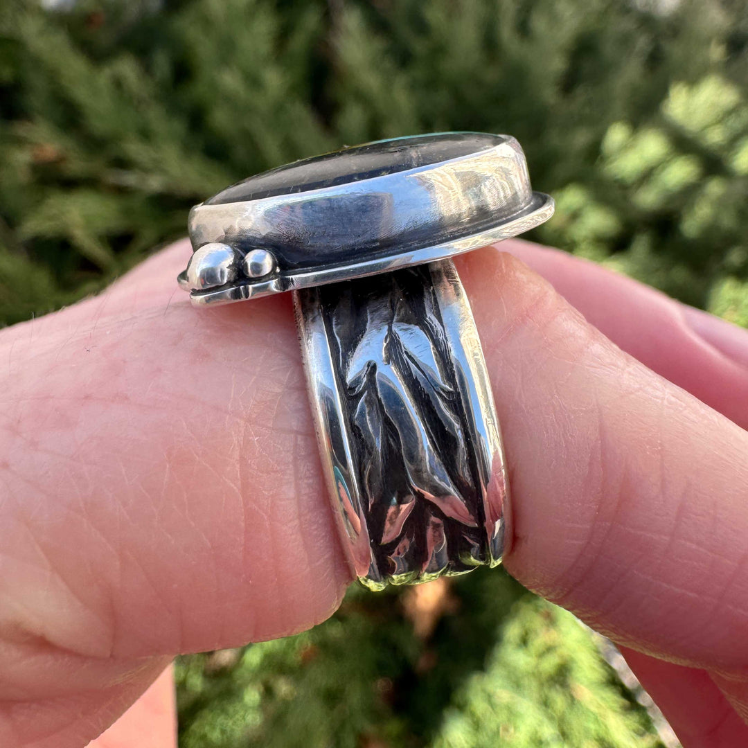 Wide sterling silver ring shank with wheat pattern impression die texture, oxidized detail