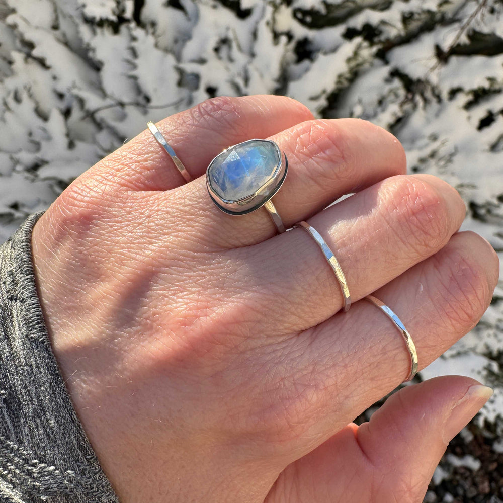 Rose cut rainbow moonstone ring size 6.5 on hand with stacker bands, deep blue flash, winter outdoor setting