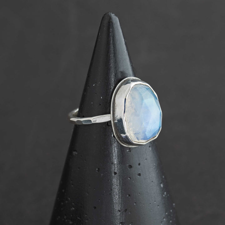 Handmade rose cut rainbow moonstone ring size 6.5 in sterling silver bezel, side view showing hammered band