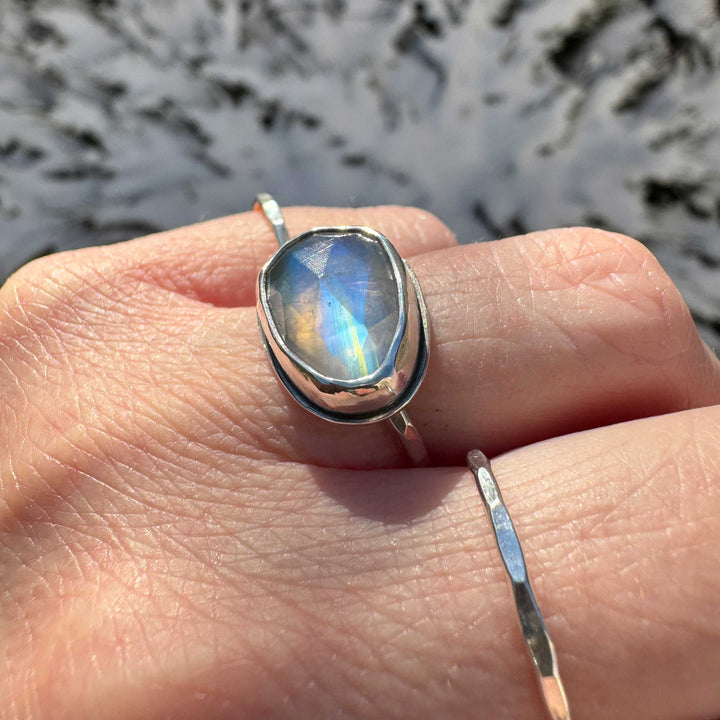 Rose cut rainbow moonstone bezel ring size 6 close up, strong blue flash in natural light