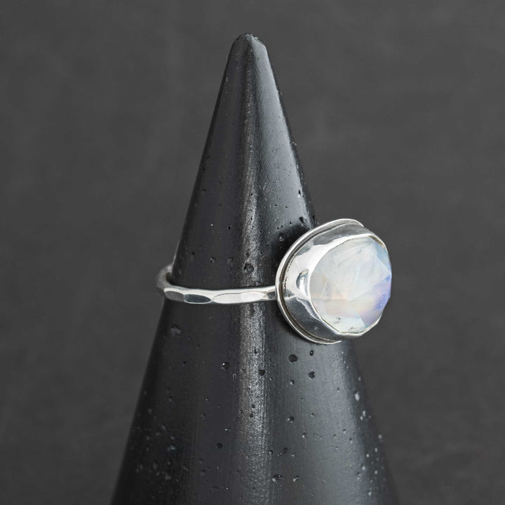 Handmade rose cut rainbow moonstone ring size 9.5 in sterling silver bezel, side view showing hammered band