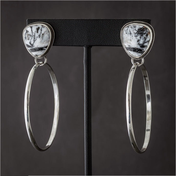 White Buffalo hoop earrings in sterling silver. Handmade in Fort Collins, Colorado.