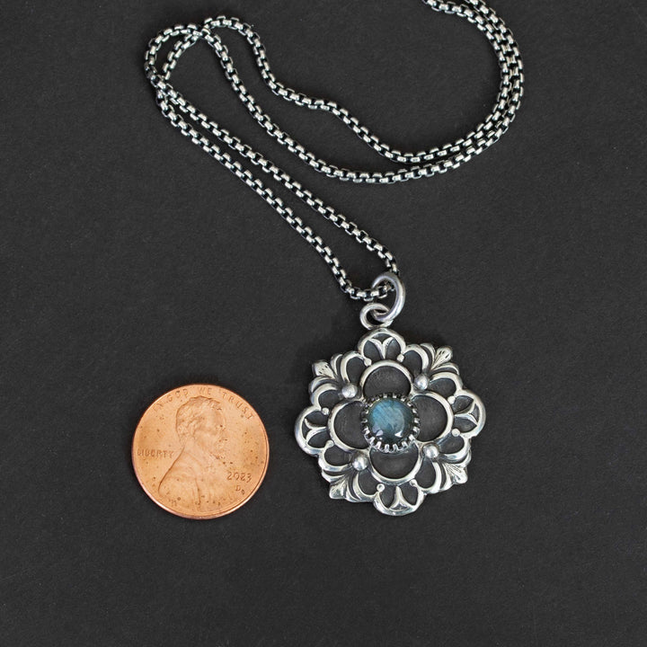 Sterling silver quatrefoil pendant with blue labradorite gemstone and French Gothic design