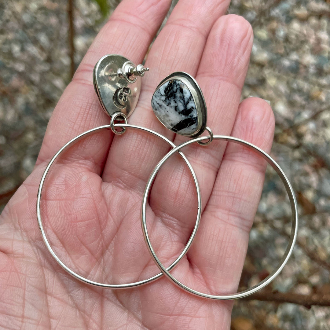 White Buffalo turquoise hoop earrings with large dangles. Handmade in Fort Collins, Colorado.