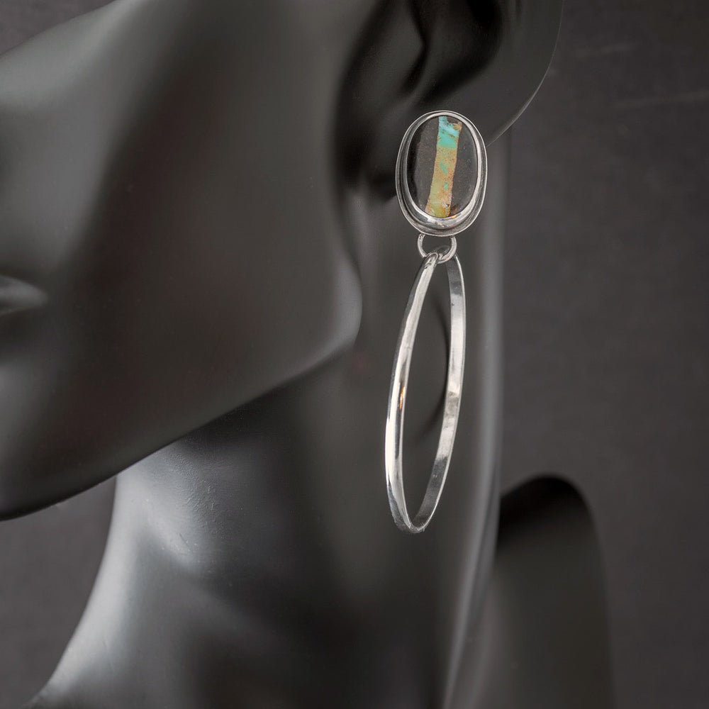 Black jack turquoise hoop earrings with long silver dangles. Made in Fort Collins, Colorado.