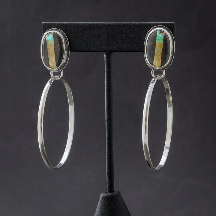 Blackjack turquoise stud earrings with sterling silver hoops. Handmade in Fort Collins, Colorado.