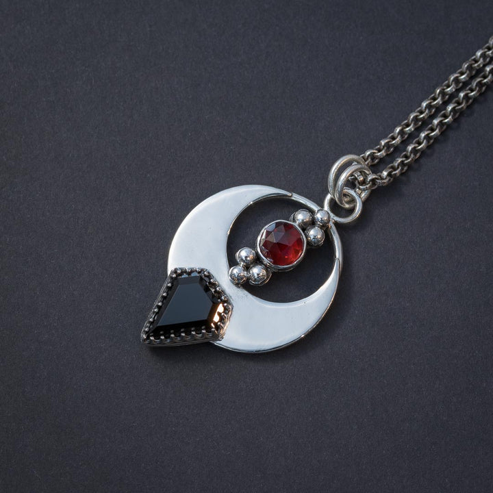 Elegant gothic necklace with garnet and onyx stones, one of a kind.